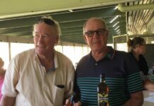 Golfers swing their clubs on Memorial Day