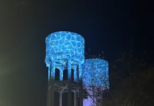 Water towers illuminate the town’s artistic spark